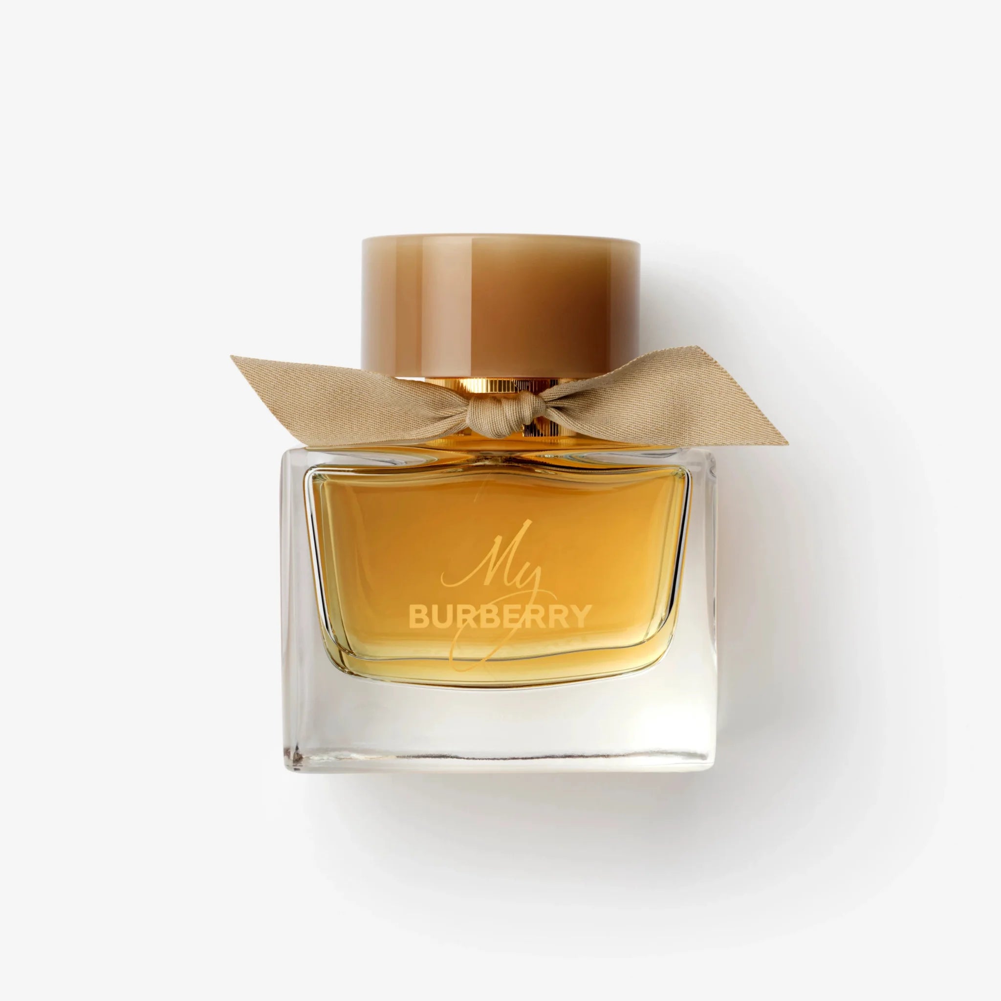 my Burberry perfume bottle with gold cap on a white background