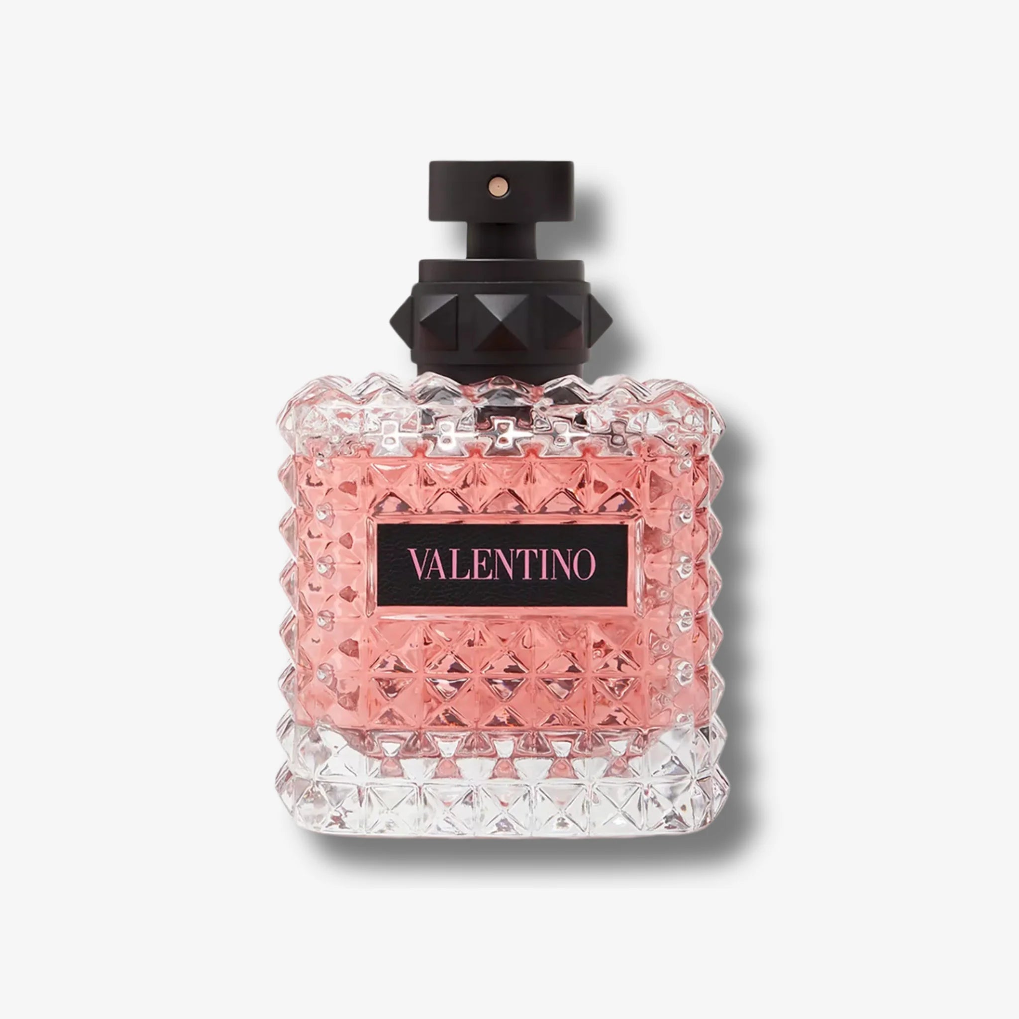 Valentino born in roma for her perfume bottle with pink diamond-patterned design on a white background