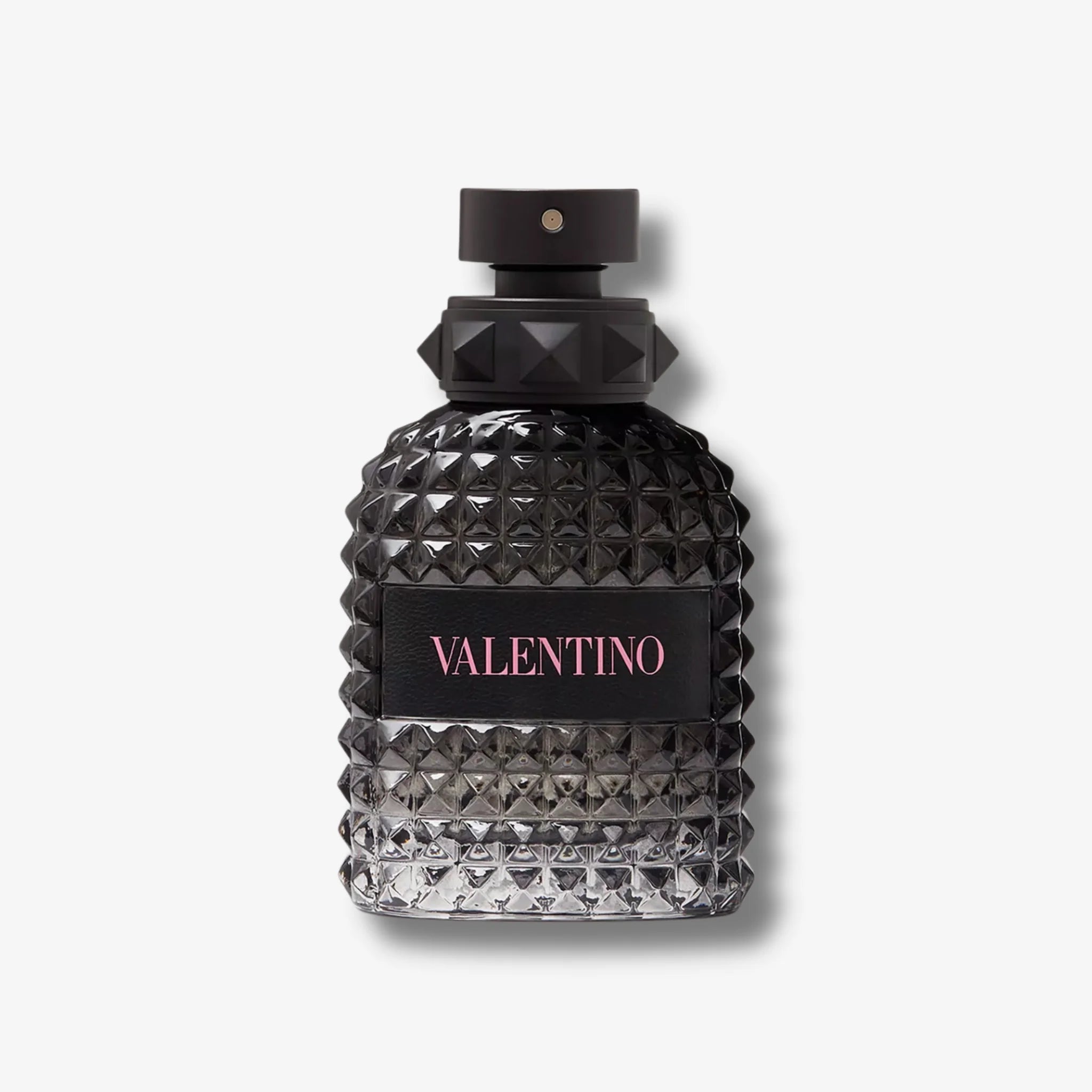 Valentino uomo born in roma for him edt 100ml in light black and white perfume bottle on a off white background