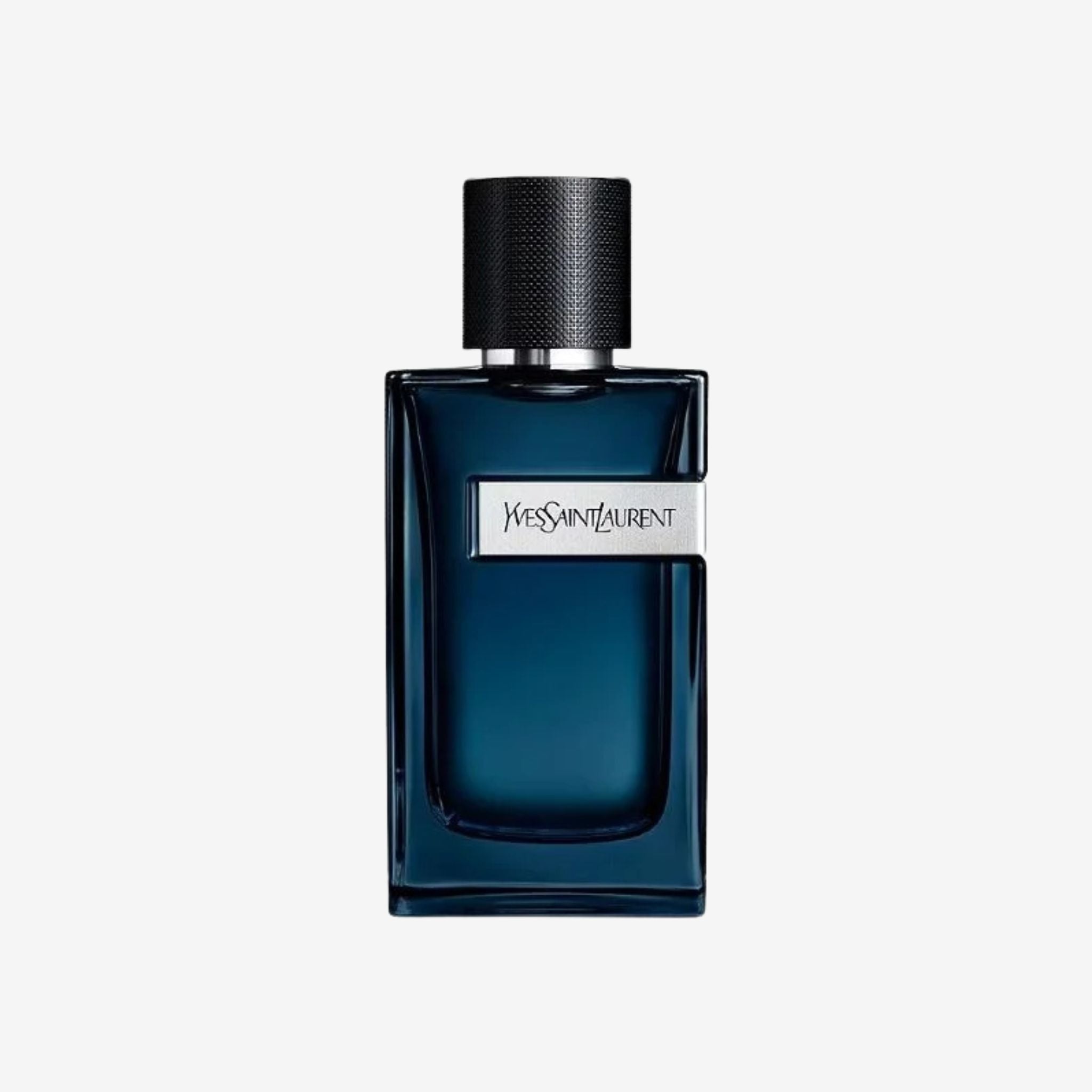 Close-up of YSL Y Intense Men EDP bottle featuring the signature Y-shaped metallic plate and gradient blue-black design.